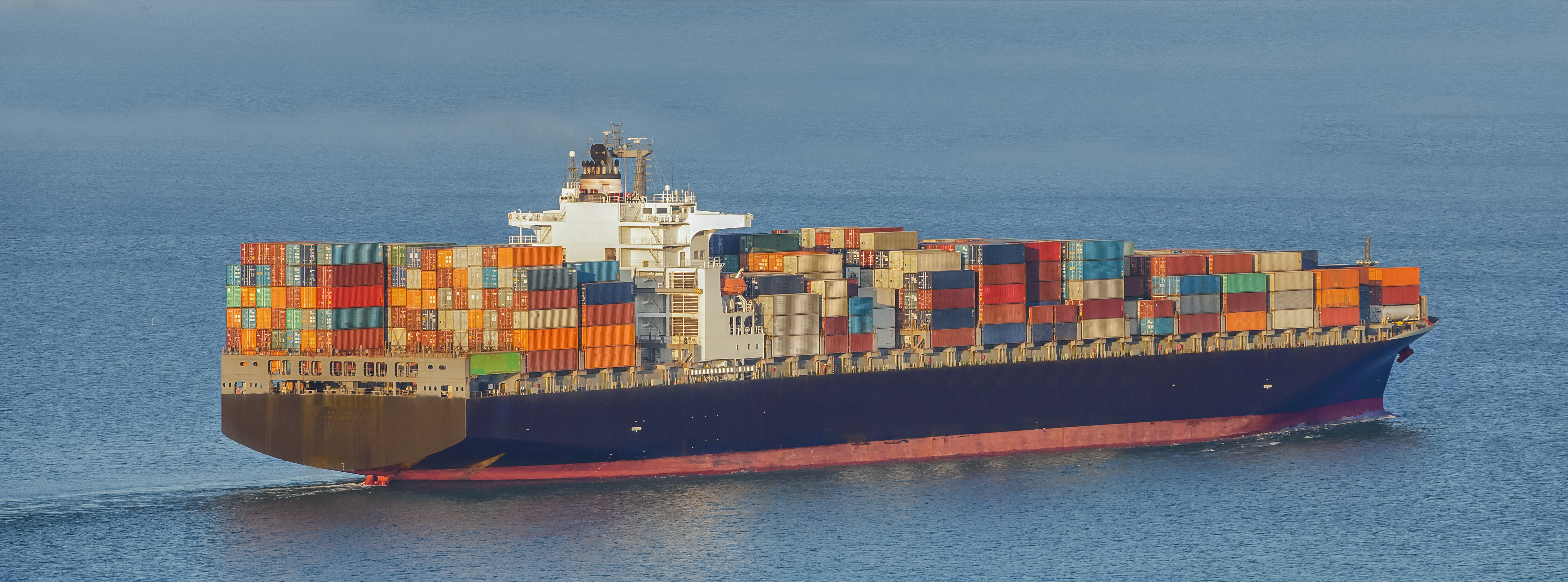 cargo container ship in mediterranean coast